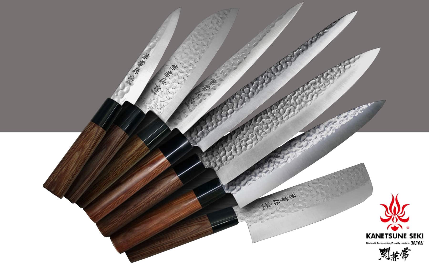 The Kanetsune-KC-950  seven-piece Japanese kitchen knife set shown here with the knives fanned out over a grey and white background with the Kanetsune logo in the bottom right.