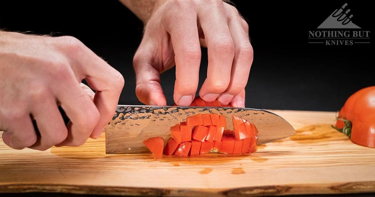 https://www.nothingbutknives.com/wp-content/uploads/2017/03/Slicing-A-Tomato-With-the-Enso-HD-Santokuf-Knife.jpg