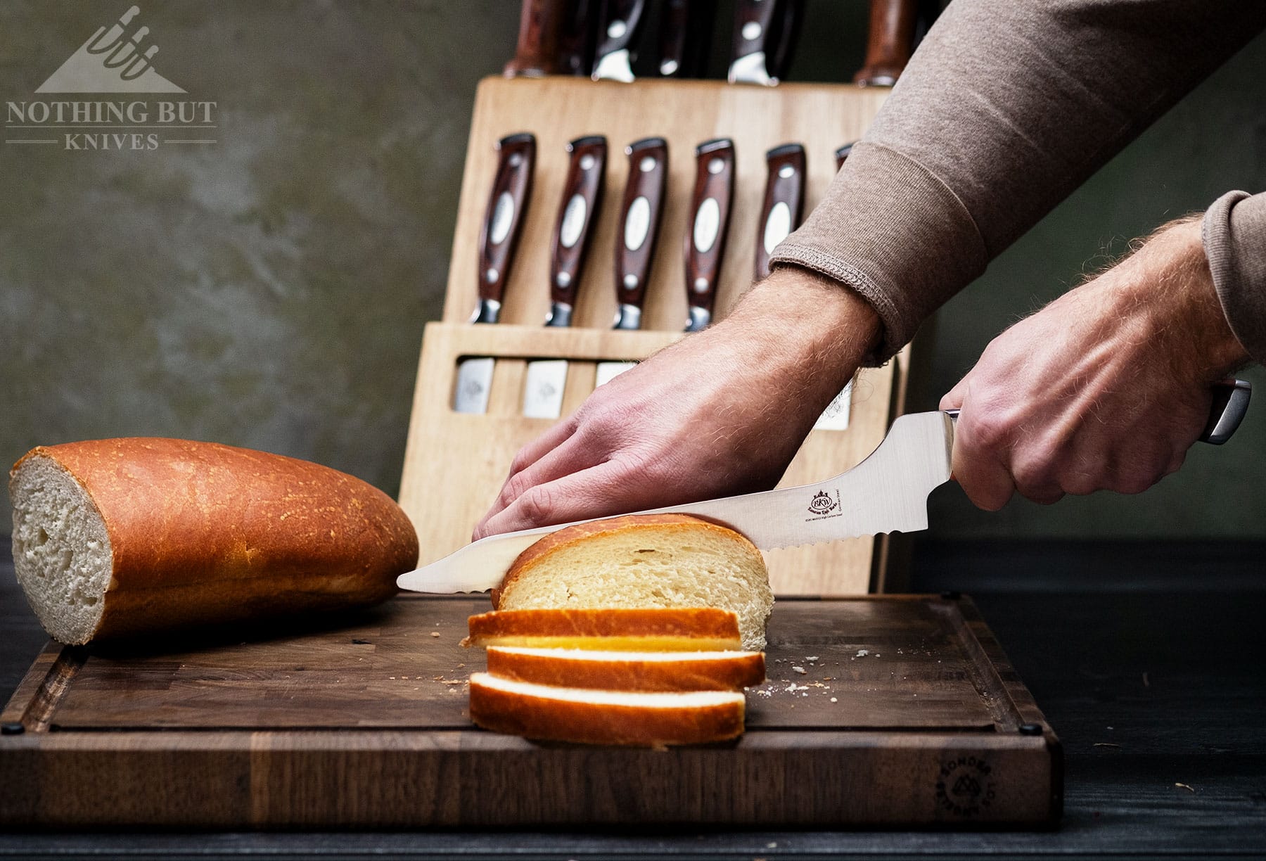 Slicing a loaf of French bread with the Bavarian Knifeworks bread knife.