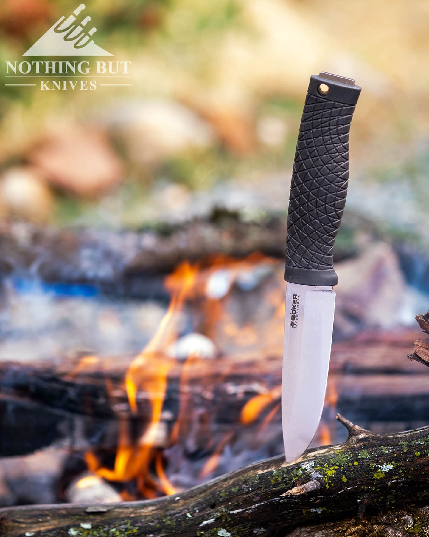 The Boker Bronco made in Solingen, Germany is pictured here next to a campfire,