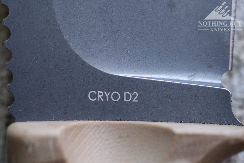 A macro image od a Cryo D2 steel stamp on the base of a fixed blade knife