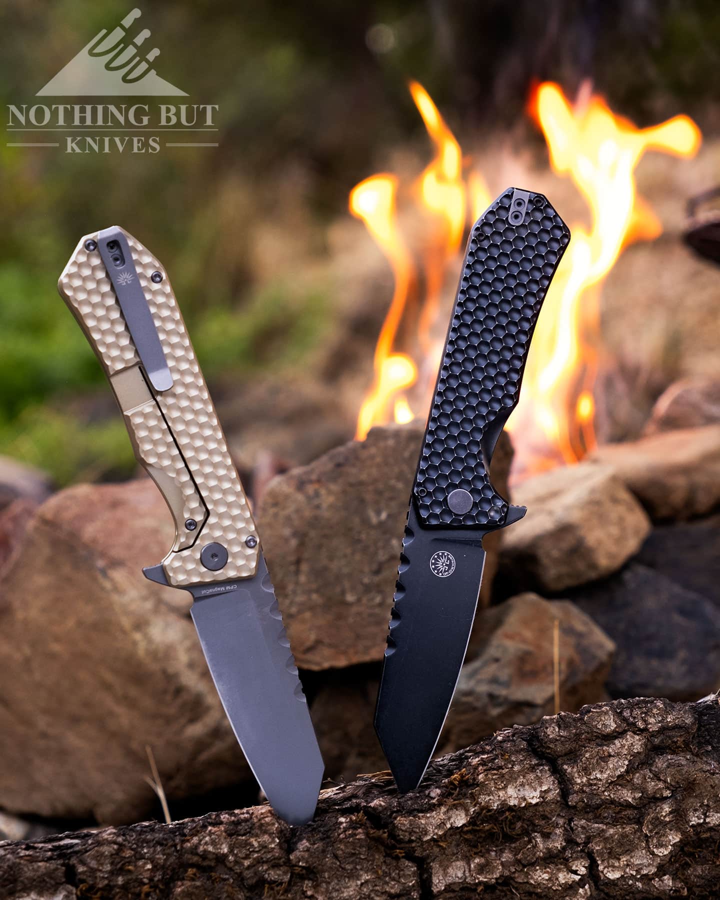 The two different models of the Off-Grid Black Mamba V3 sticking out of a log in front of a campfire.