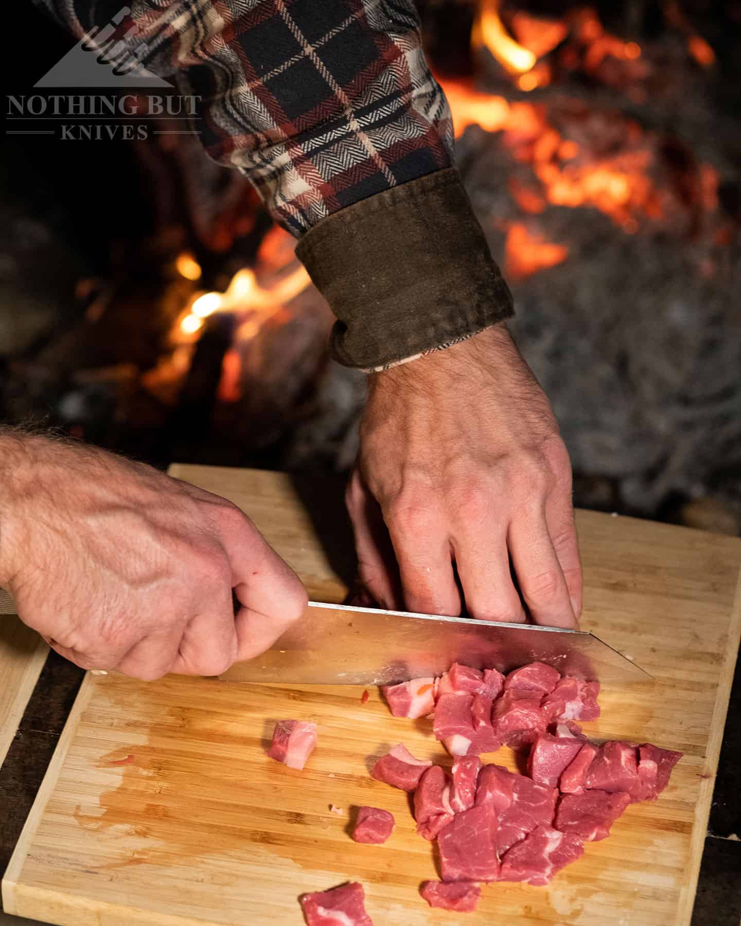 https://www.nothingbutknives.com/wp-content/uploads/2023/01/Cutting-Meat-with-the-Overland-Chef-Knife.jpg