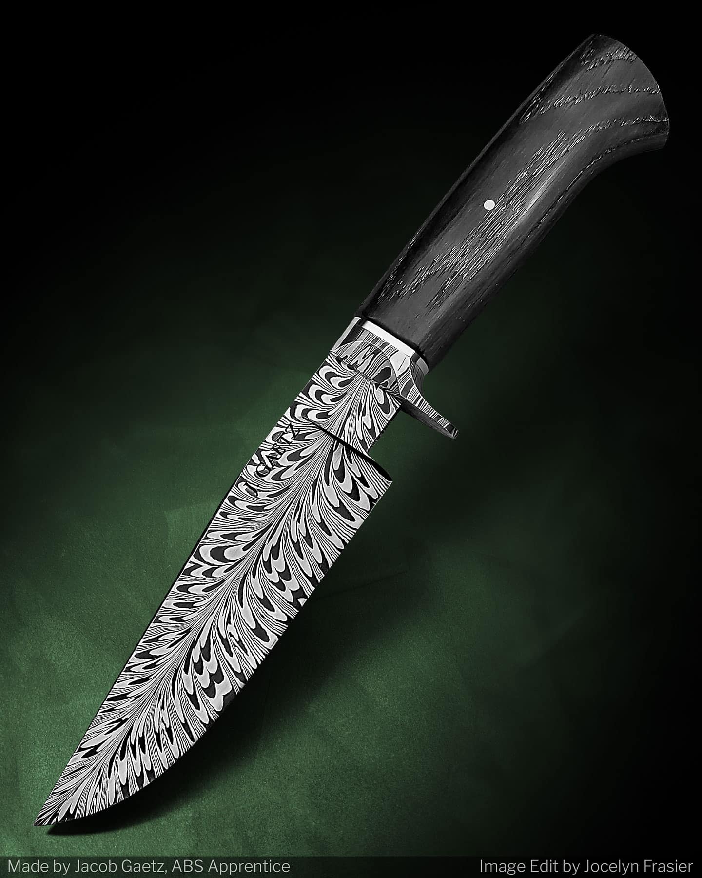 Custom Hunter in 1084 and 15n20 Damascus steel with an Oak handle. 