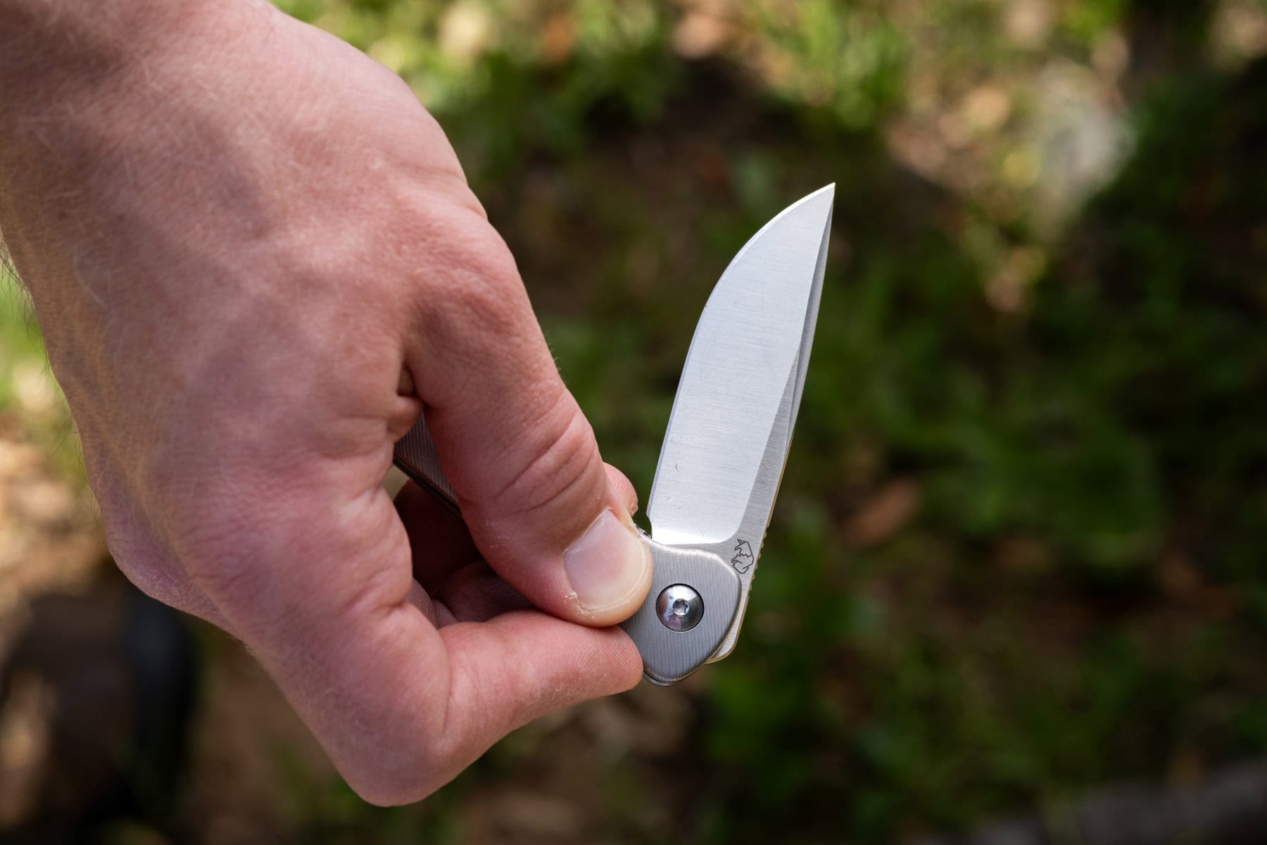 Flipping open the titanium Fast Eddie to show off the snappy action.