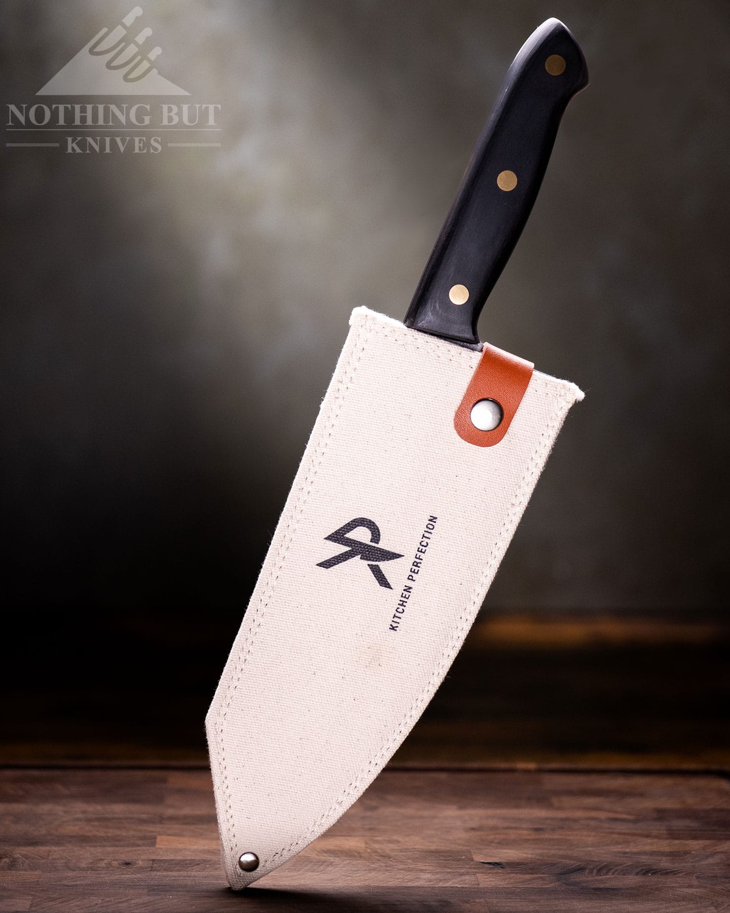 The Kitchen Perfection 8-inch chef knife in its canvas sheath. 