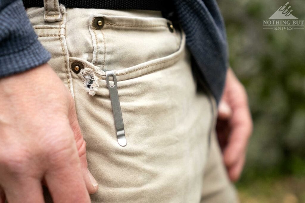 The Maximal tucked into a pants pocket with only the pocket clip showing.